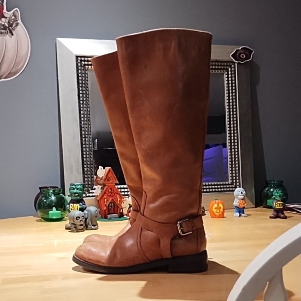 Woman's brown leather knee high boots